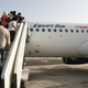 Illustration for article titled Science reveals the most efficient way to get on an airplane